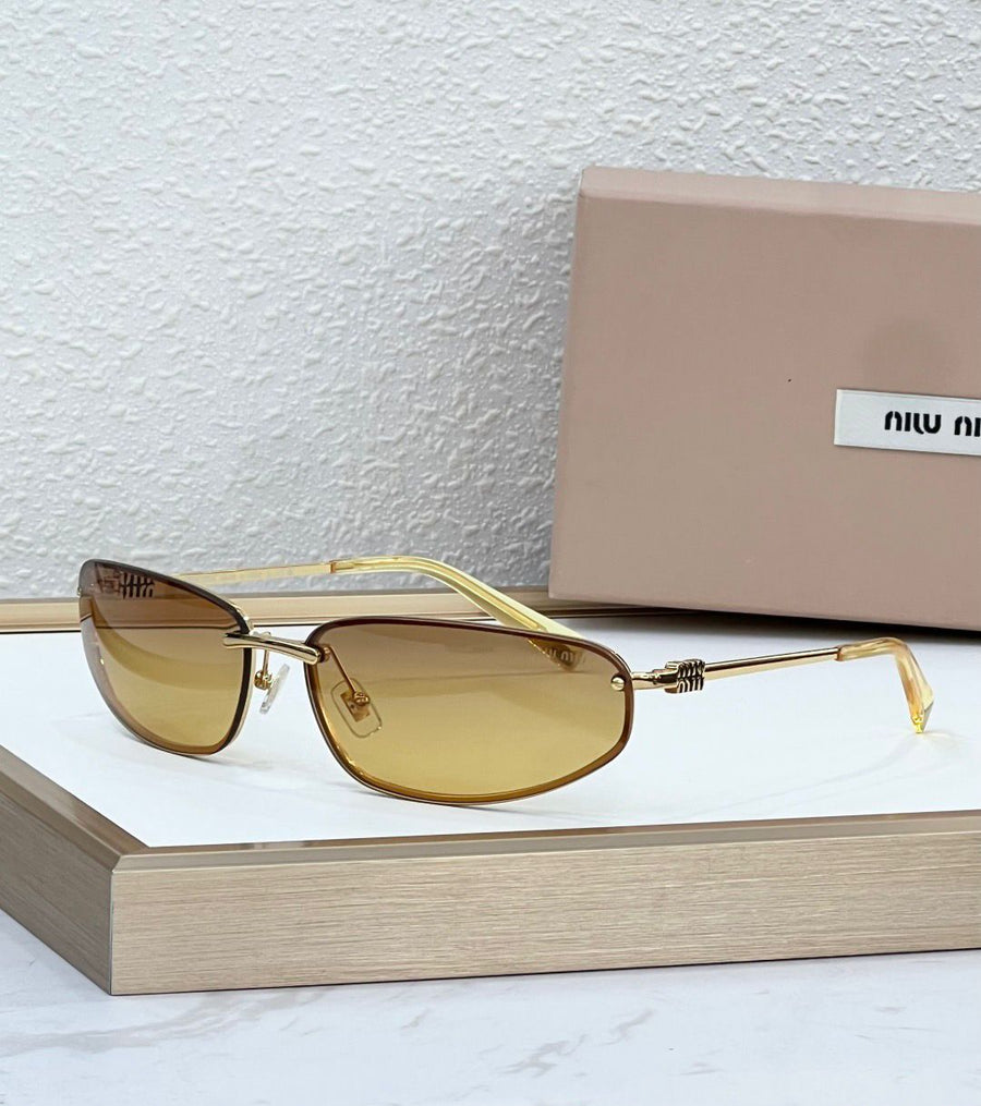 Óculos Miu Miu Gold