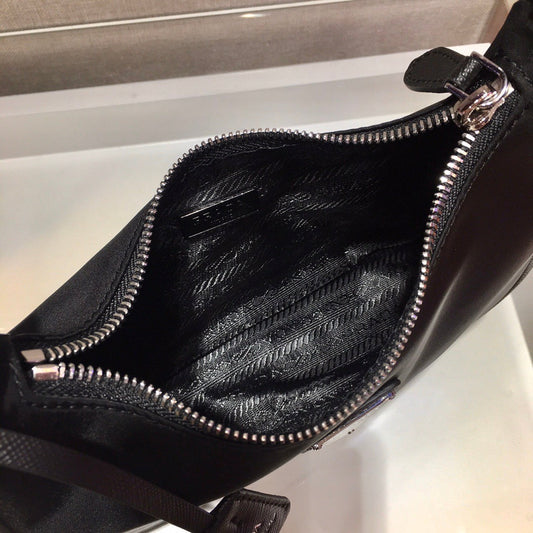 Bolsa Prada mini Re-Edition 2000